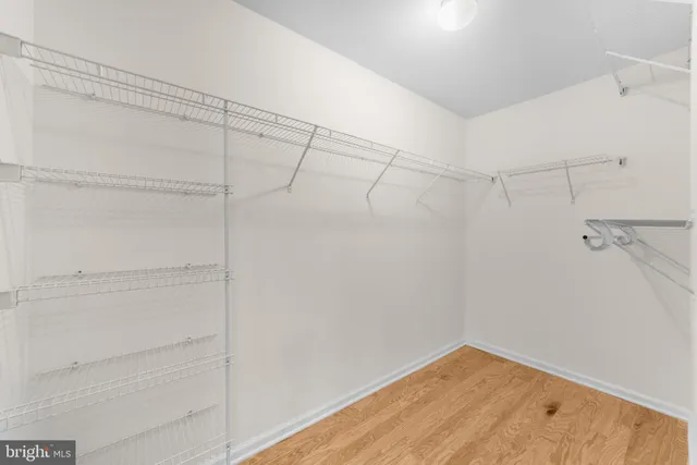 a view of a room with racks on the wall