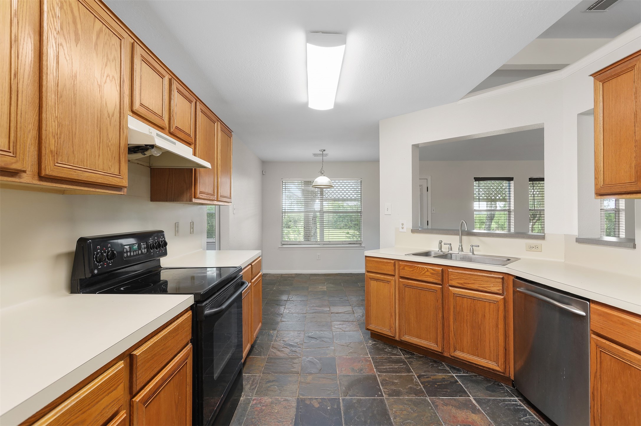 1333 Highway 36 Rosenberg, TX 77471 - Photo 18 of 40 a kitchen with a sink stove and cabinets