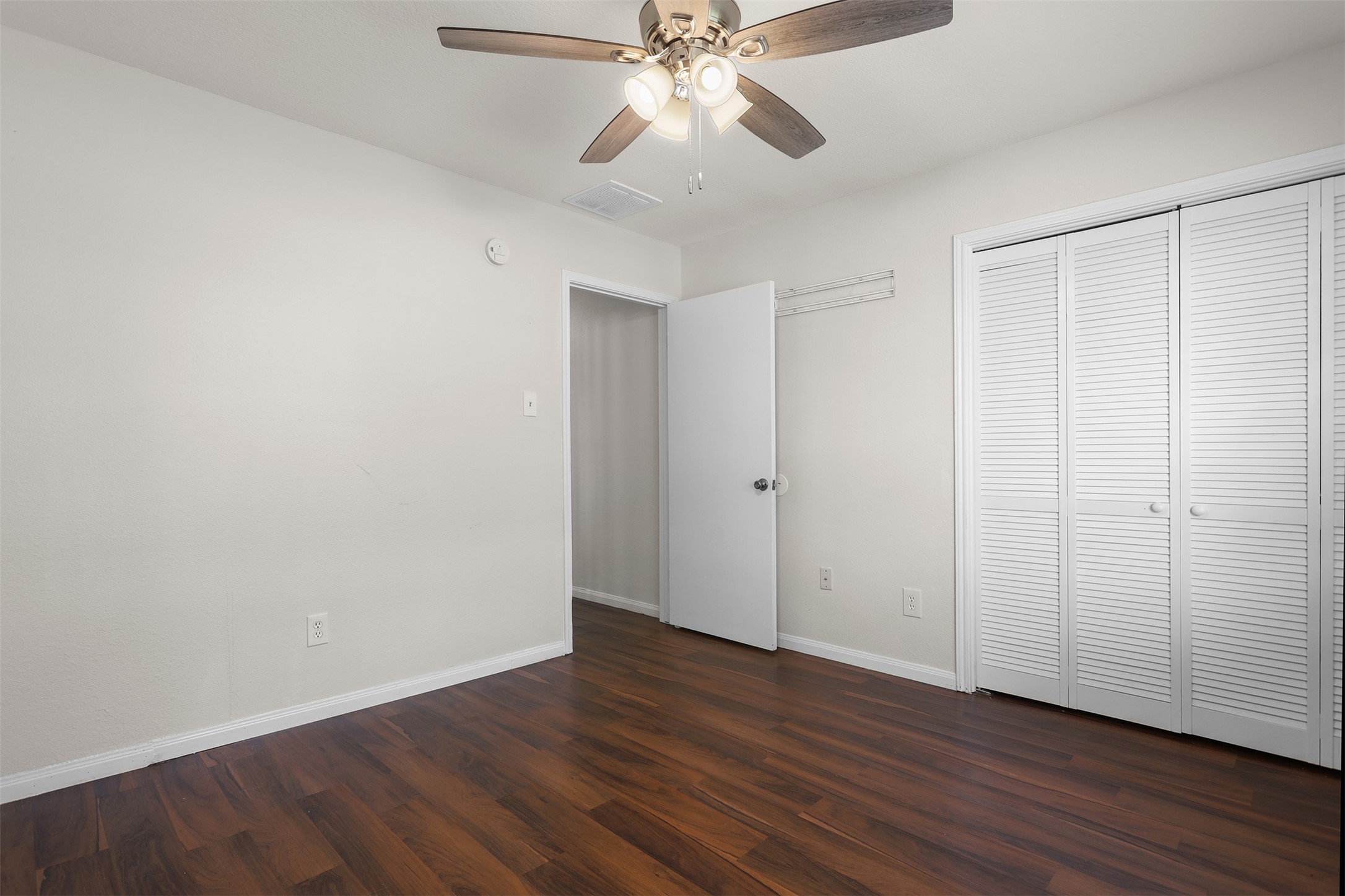 1333 Highway 36 Rosenberg, TX 77471 - Photo 25 of 40 a view of an empty room with wooden floor