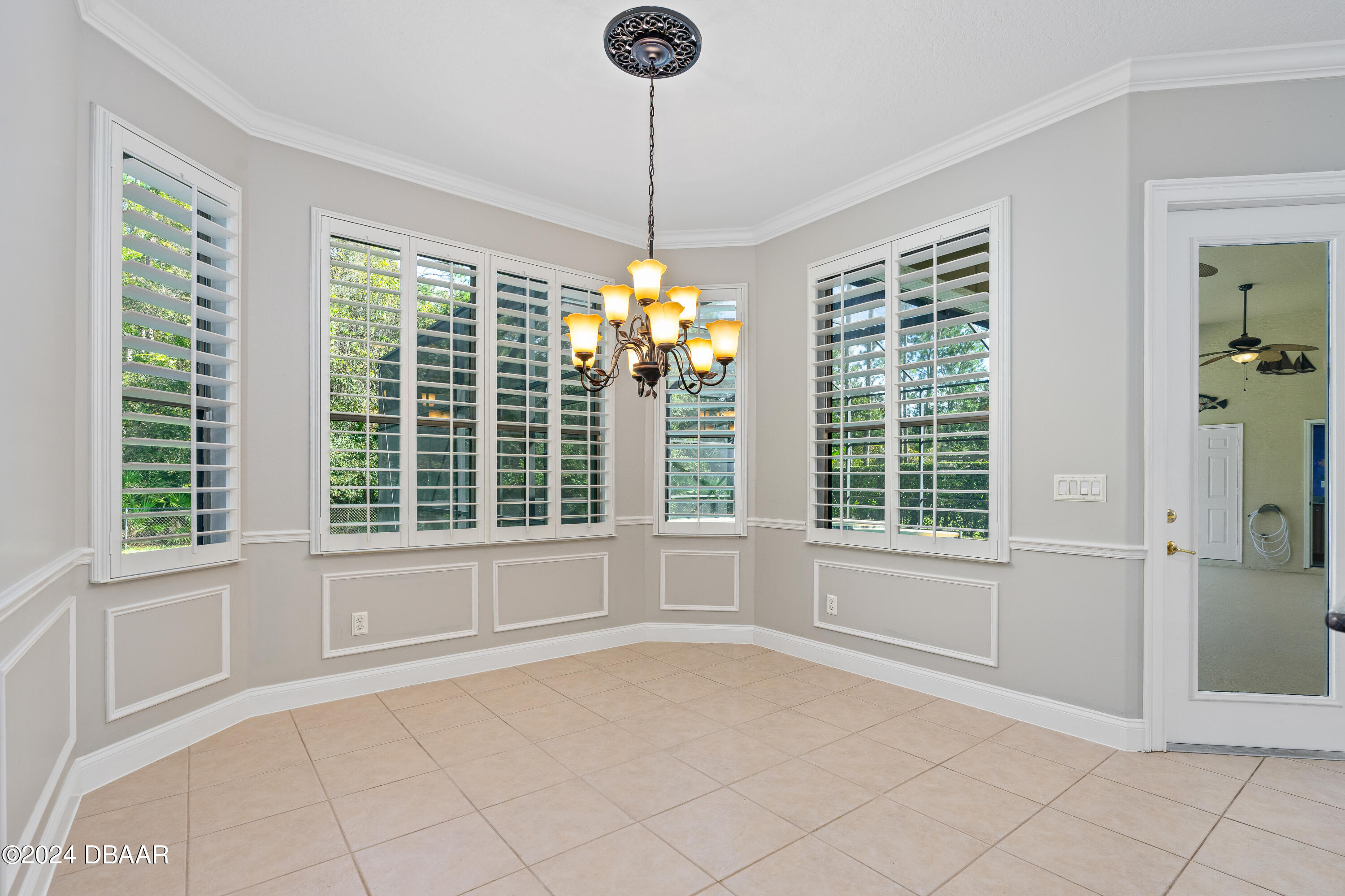 16 Foxcroft Ormond Beach Ormond Beach, FL 32174 - Photo 14 of 54 a view of an empty room with a window