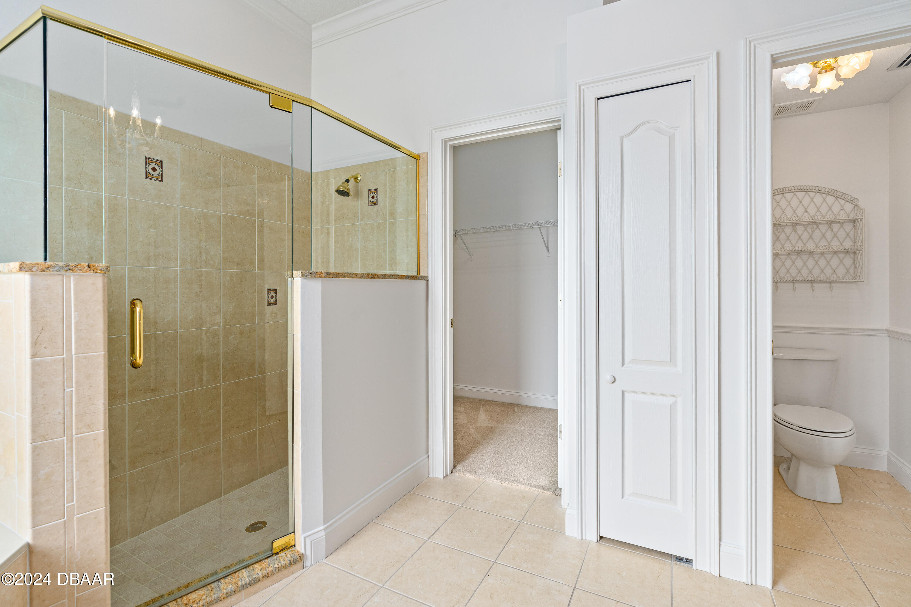 16 Foxcroft Ormond Beach Ormond Beach, FL 32174 - Photo 18 of 54 a bathroom with a shower and a toilet