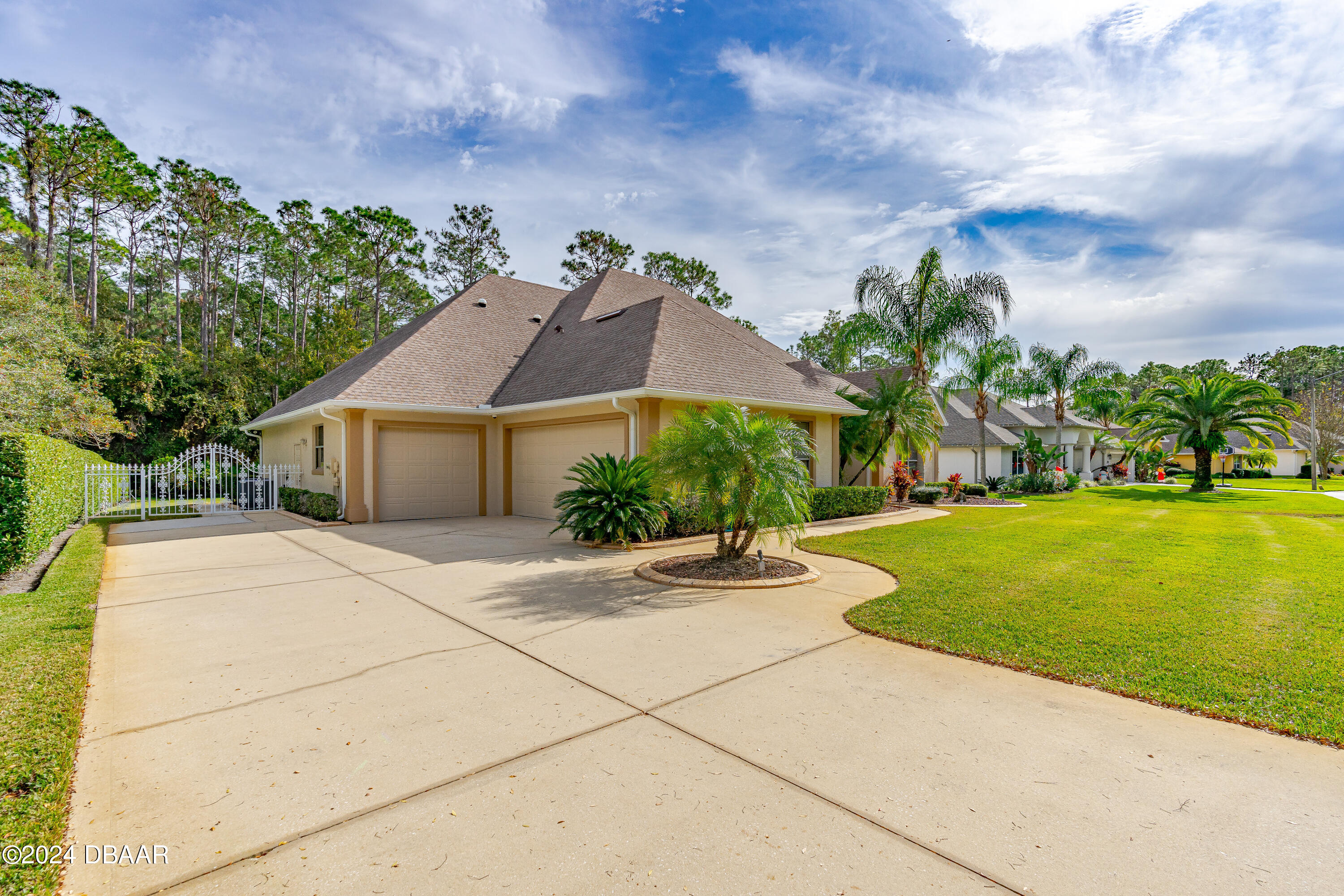 16 Foxcroft Ormond Beach Ormond Beach, FL 32174 - Photo 35 of 54 a front view of house with yard and green space