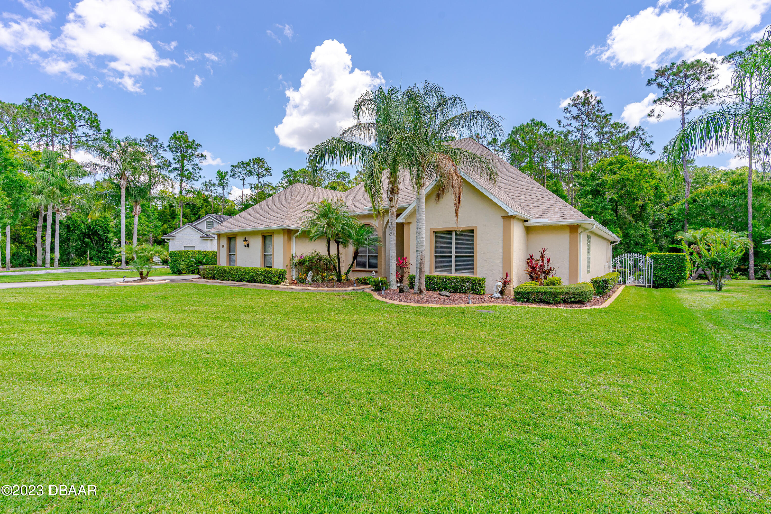 16 Foxcroft Ormond Beach Ormond Beach, FL 32174 - Photo 40 of 54 a front view of a house with garden