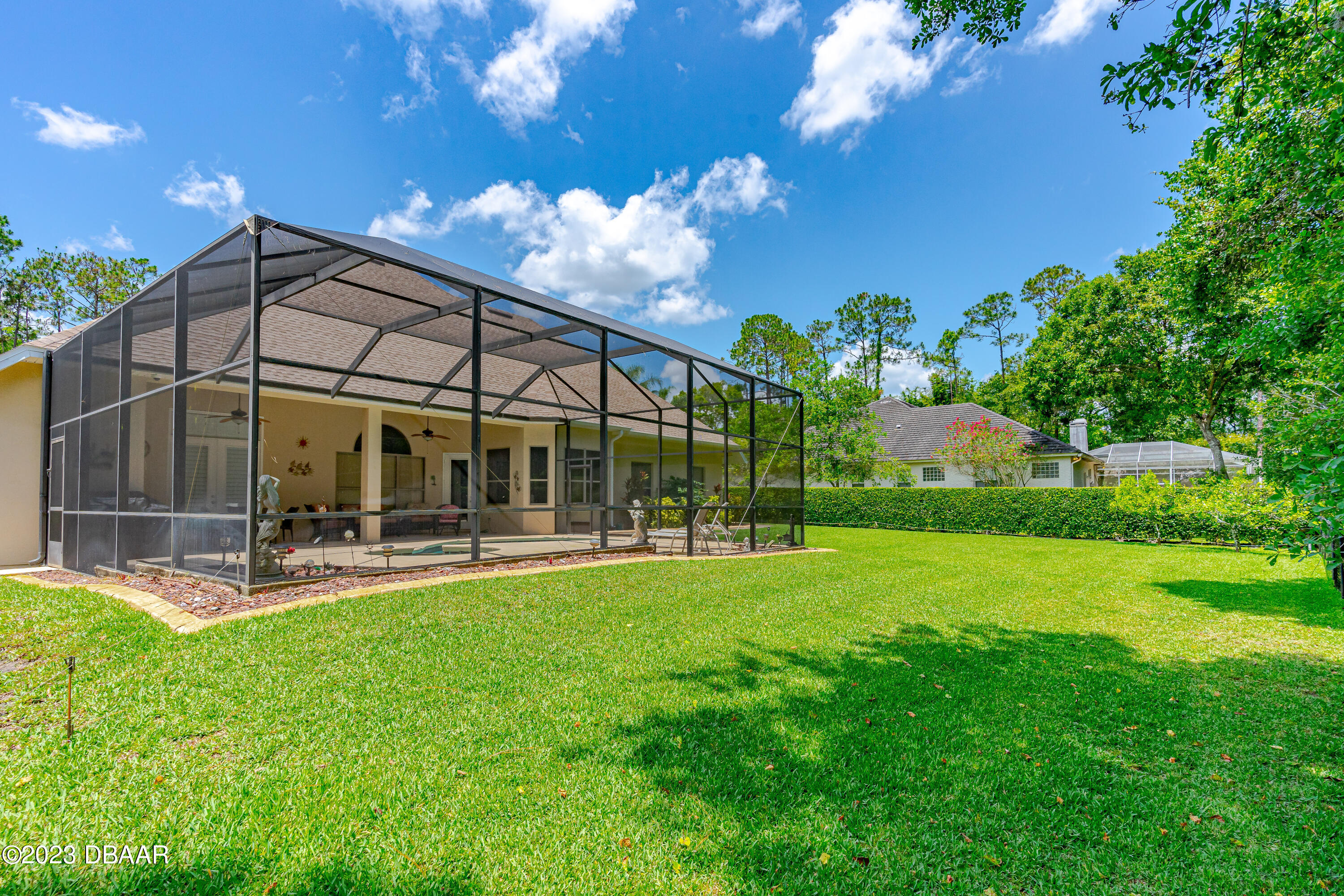 16 Foxcroft Ormond Beach Ormond Beach, FL 32174 - Photo 43 of 54 a view of a house with a yard and sitting area