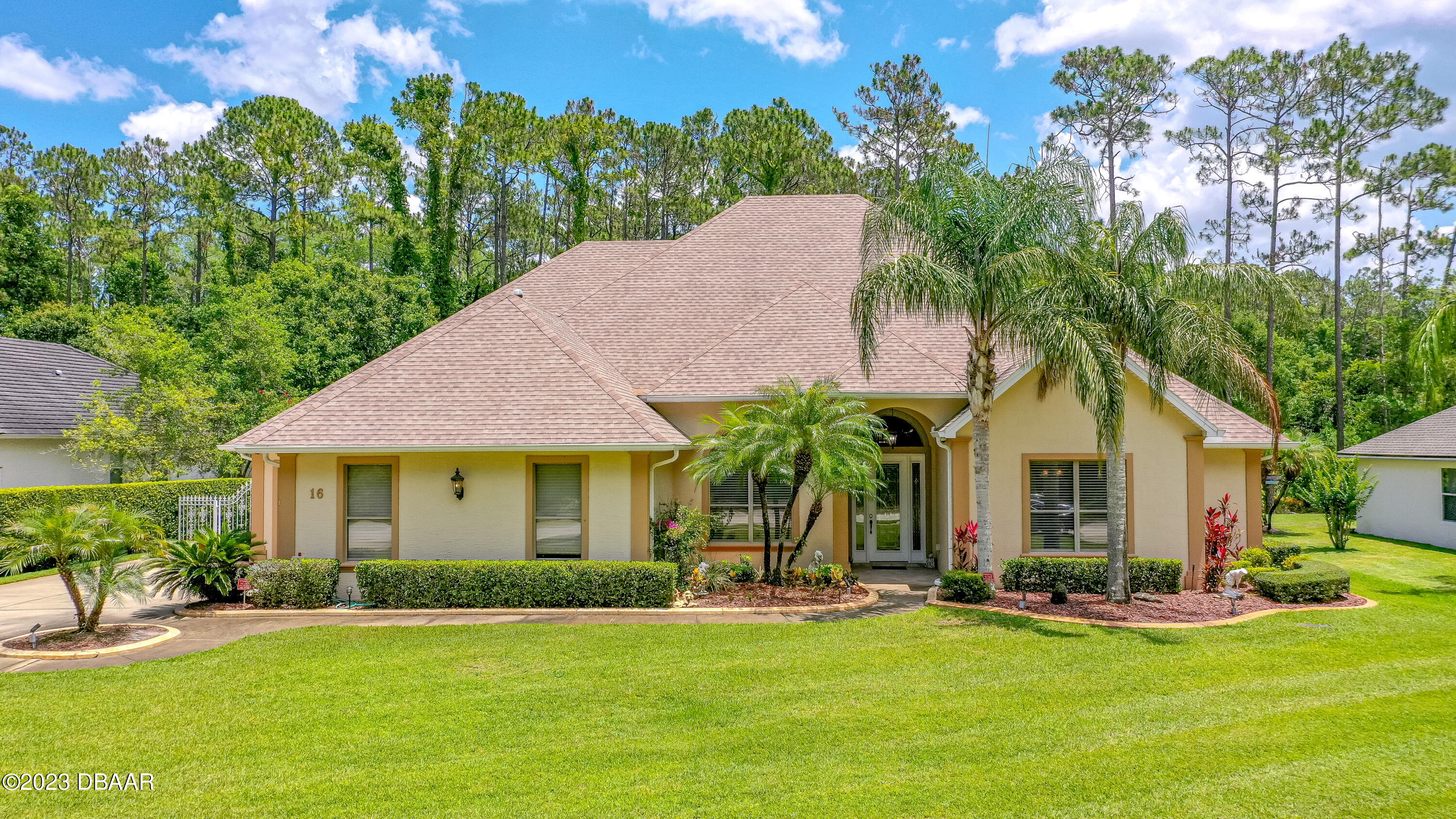 16 Foxcroft Ormond Beach Ormond Beach, FL 32174 - Photo 44 of 54 front view of a house with a yard
