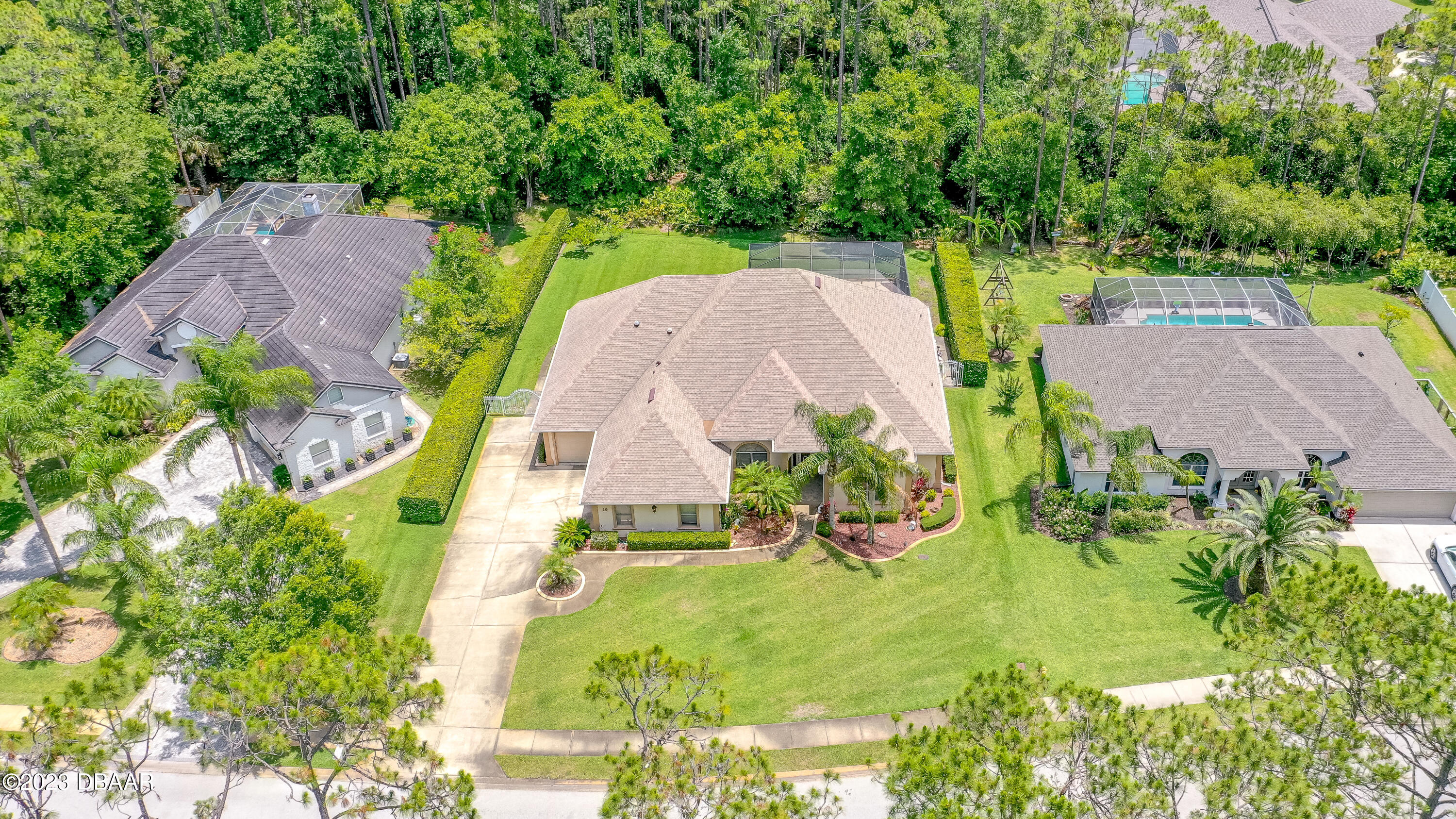 16 Foxcroft Ormond Beach Ormond Beach, FL 32174 - Photo 46 of 54 an aerial view of a house with yard swimming pool and outdoor seating