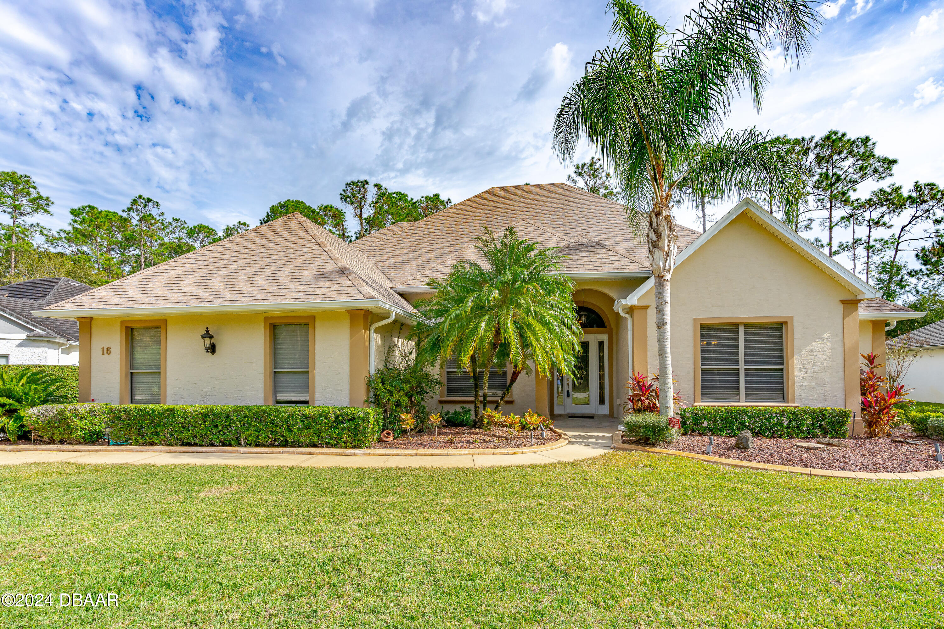 16 Foxcroft Ormond Beach Ormond Beach, FL 32174 - Photo 50 of 54 a front view of house with yard and green space