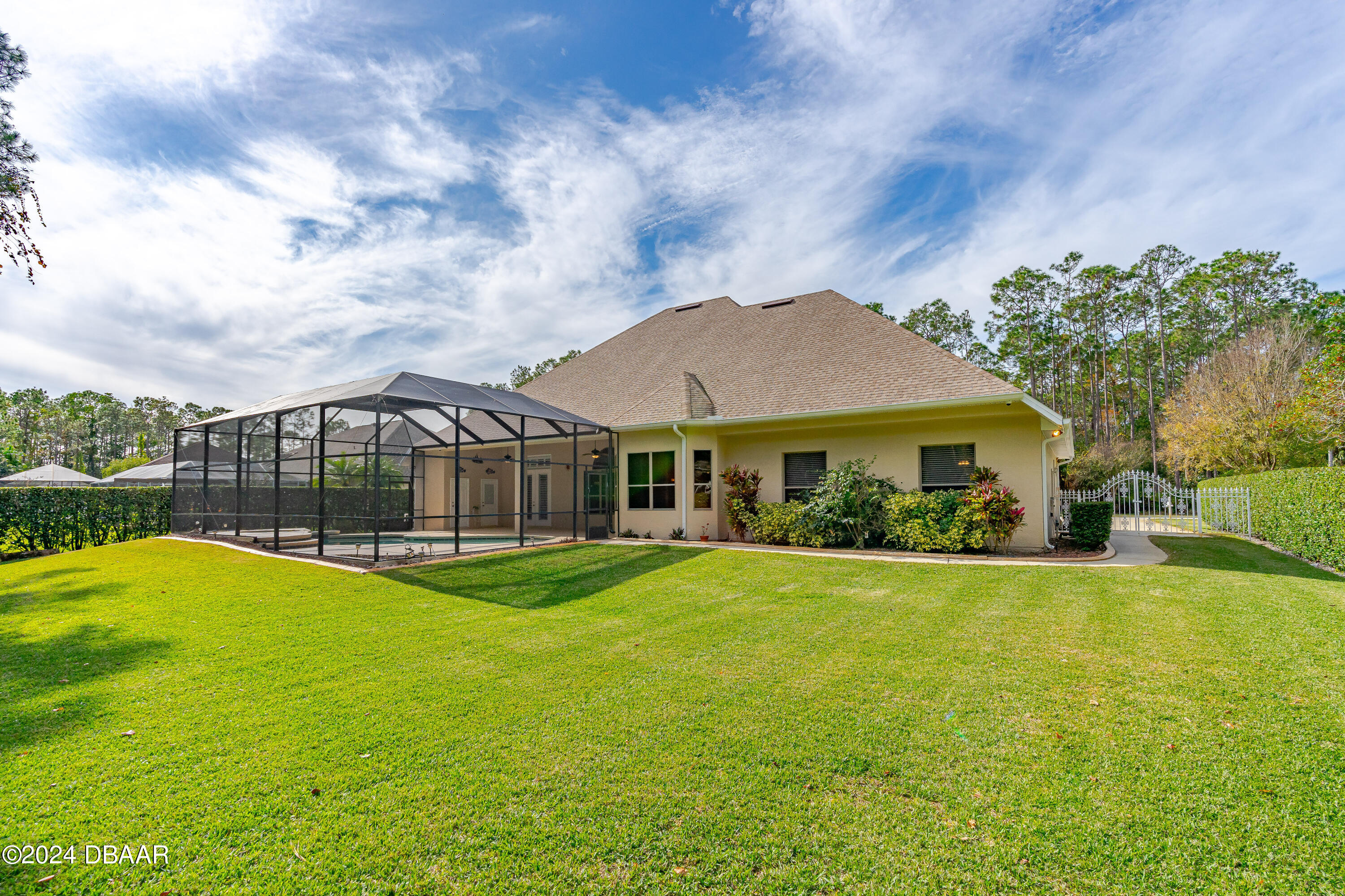 16 Foxcroft Ormond Beach Ormond Beach, FL 32174 - Photo 51 of 54 a view of a house with a yard