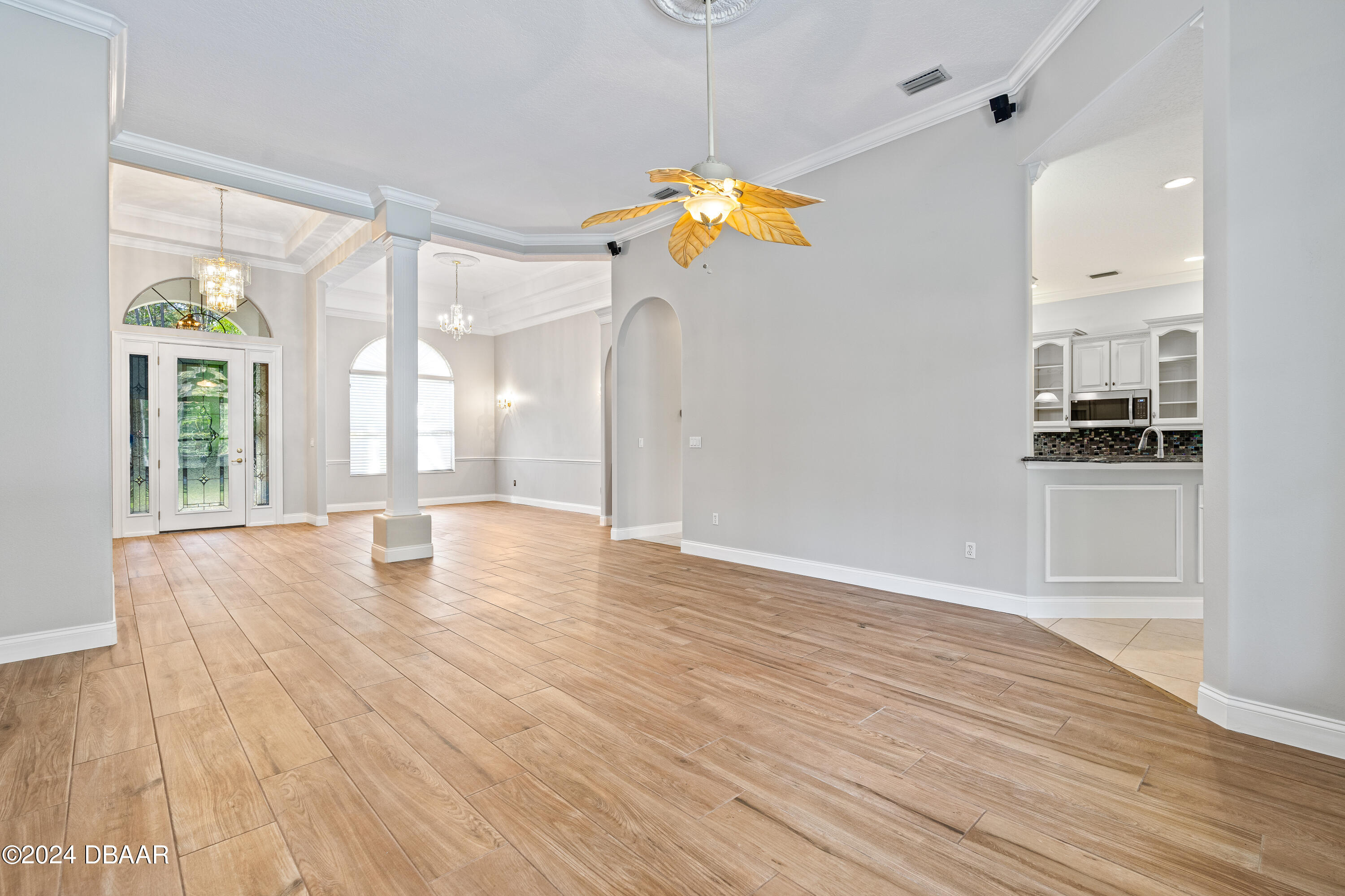 16 Foxcroft Ormond Beach Ormond Beach, FL 32174 - Photo 6 of 54 a view of a kitchen with wooden floor and a window