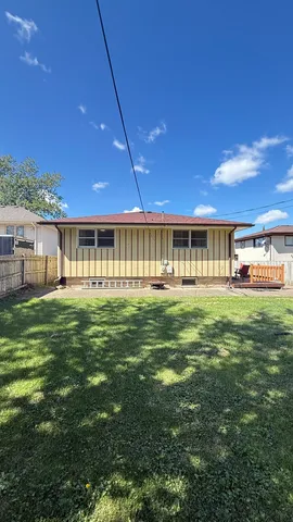 a view of a house with a big yard