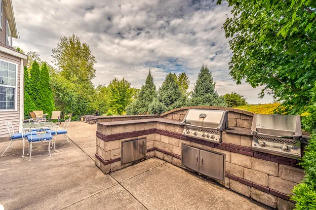 a view of a balcony with chairs