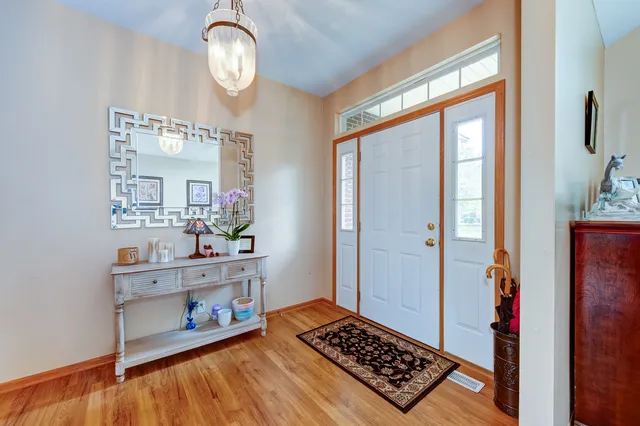 a view of room with window and hardwood floor