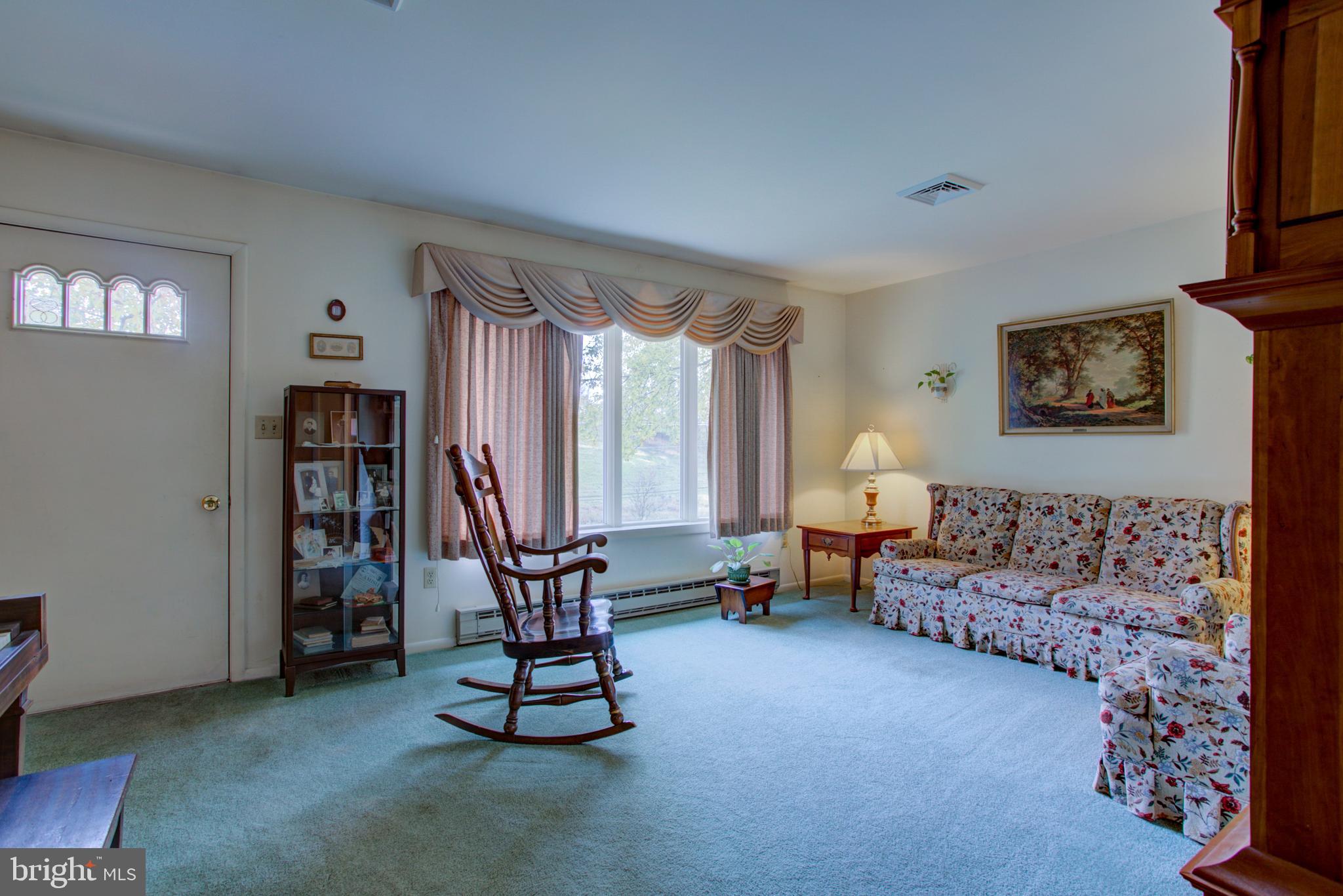 545 Doe Run Road Manheim, PA 17545 - Photo 26 of 47 a living room with furniture and a window