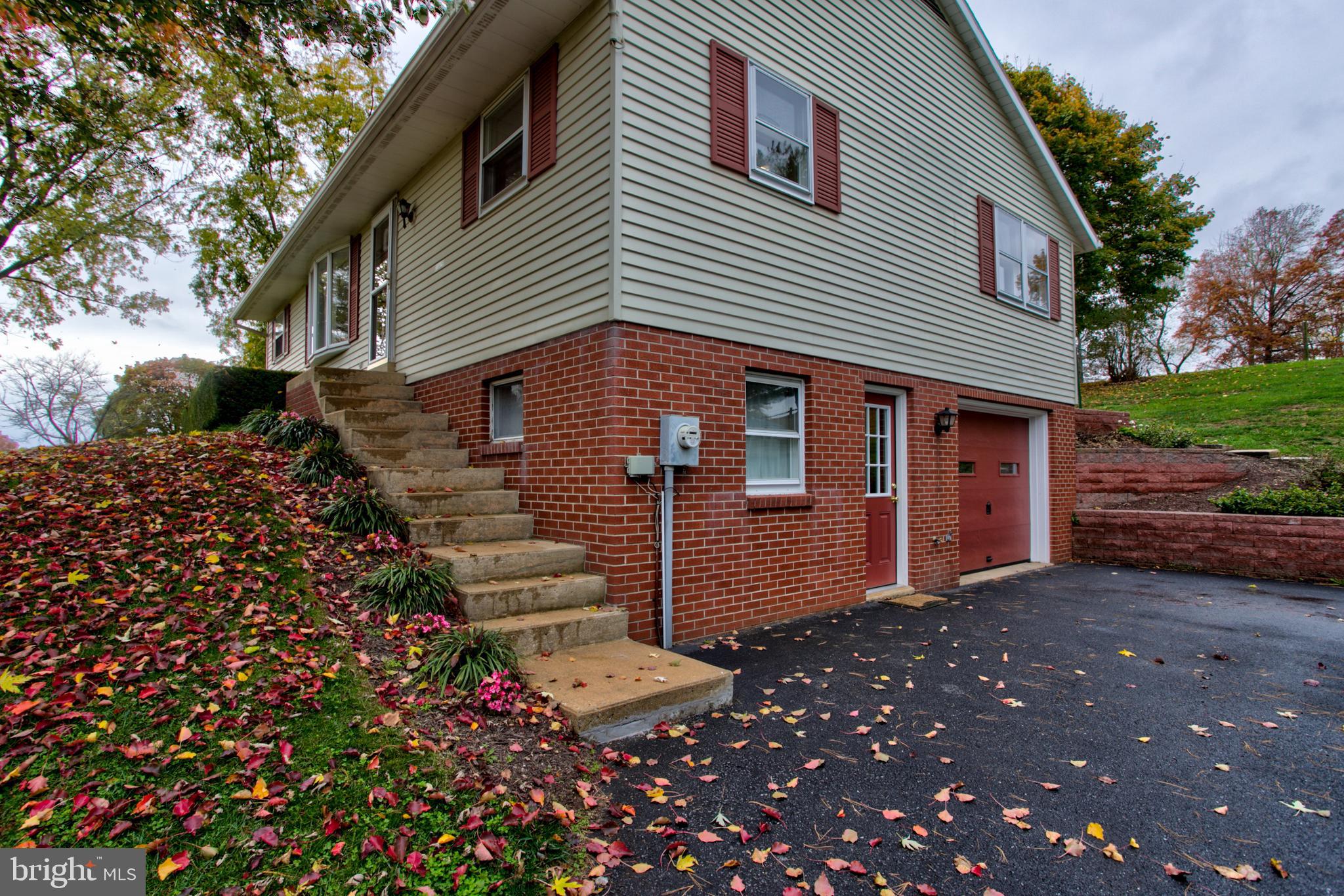 545 Doe Run Road Manheim, PA 17545 - Photo 3 of 47 a view of a house with a yard