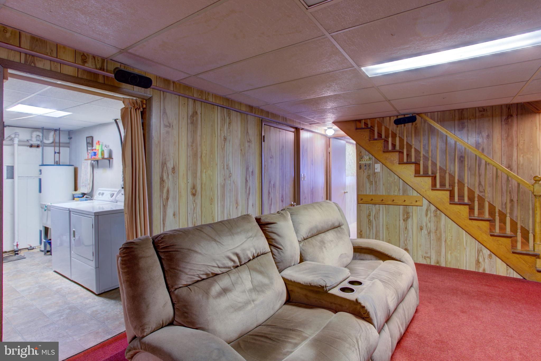 545 Doe Run Road Manheim, PA 17545 - Photo 6 of 47 a living room with furniture and a wooden floor