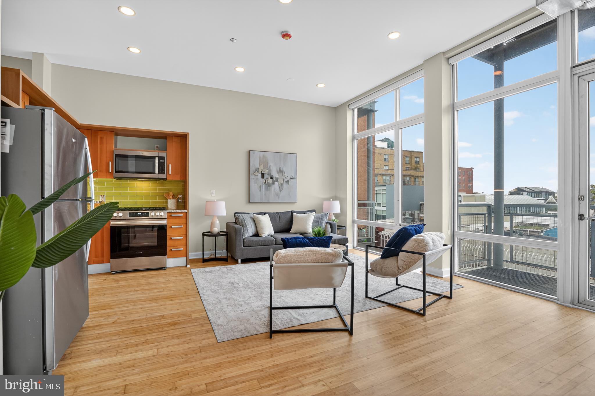 1390 V Street Northwest, Unit 306 Washington, DC 20009 - Photo 16 of 19 a living room with furniture and a flat screen tv