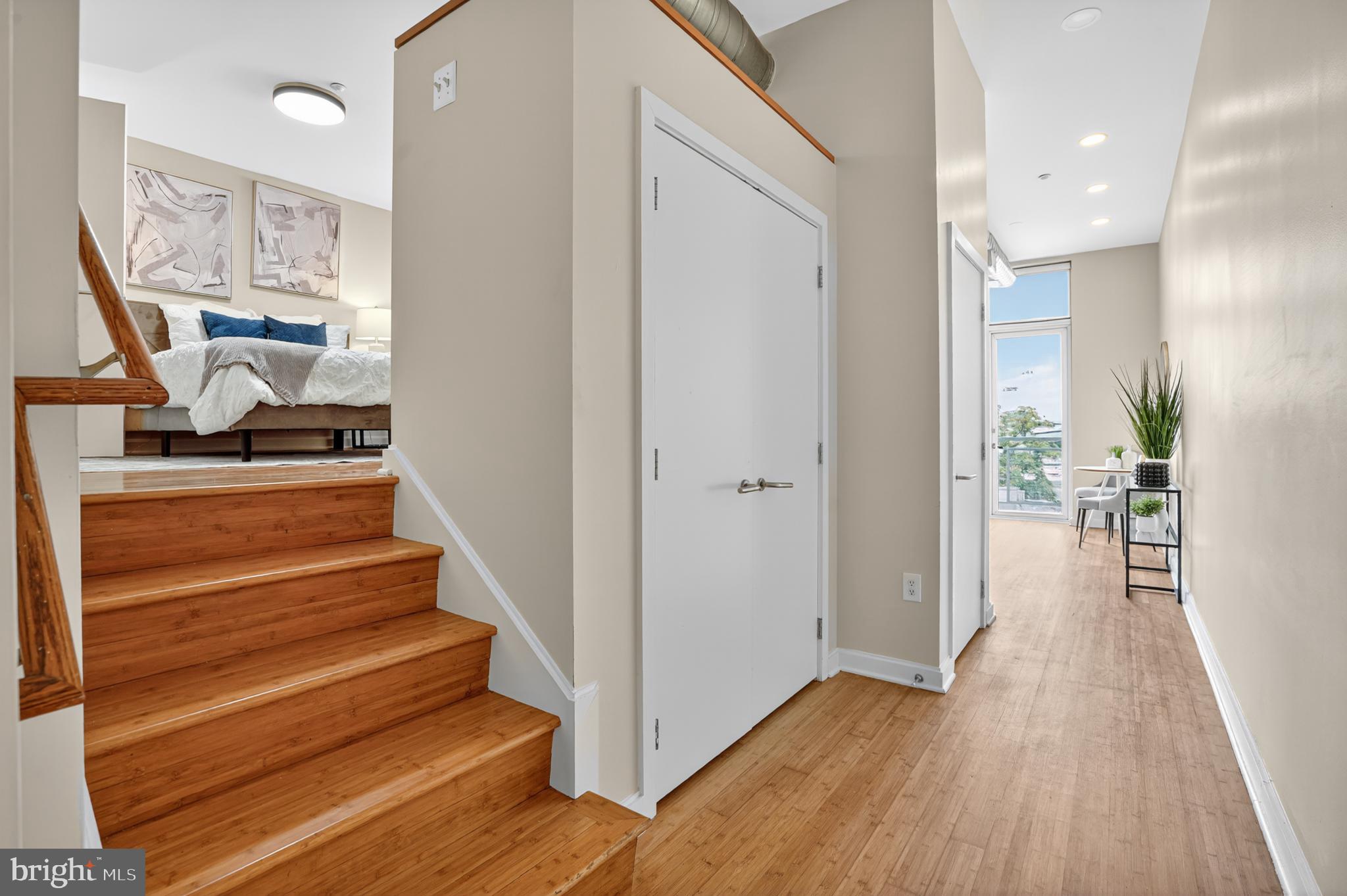1390 V Street Northwest, Unit 306 Washington, DC 20009 - Photo 7 of 19 a view of a hallway with wooden floor and entryway