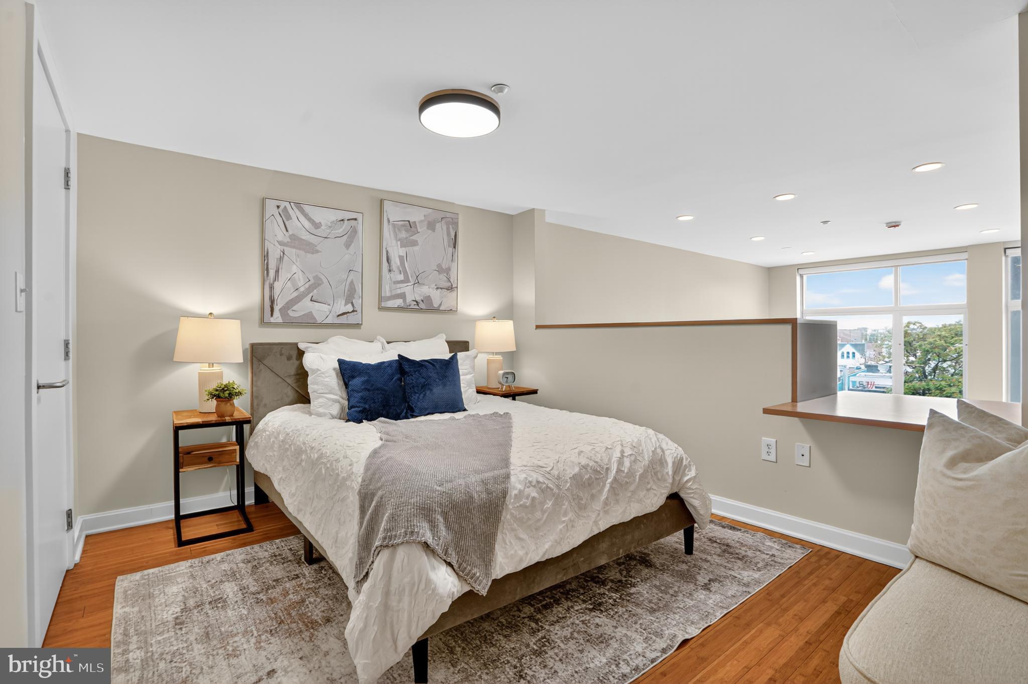 1390 V Street Northwest, Unit 306 Washington, DC 20009 - Photo 10 of 19 a bedroom with a bed and window