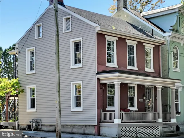 a view of a house with a small garden