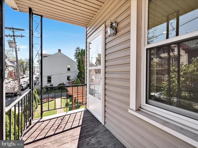 a view of balcony with a glass door