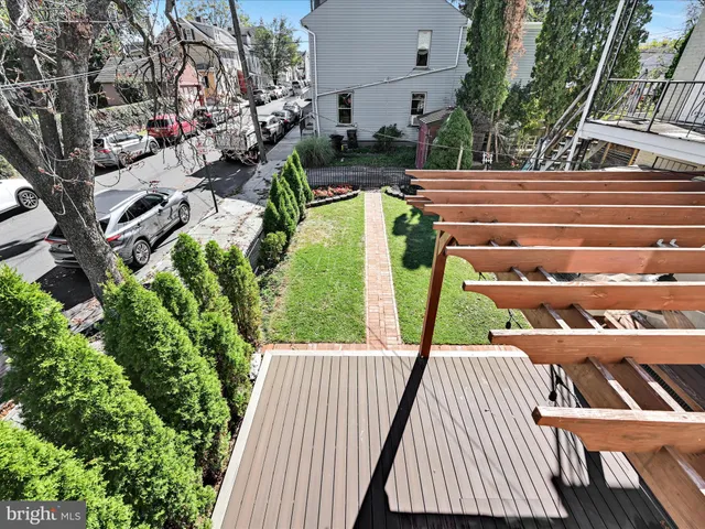 a view of a patio with swimming pool