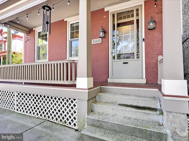 a spacious bathroom with a bathtub and shower