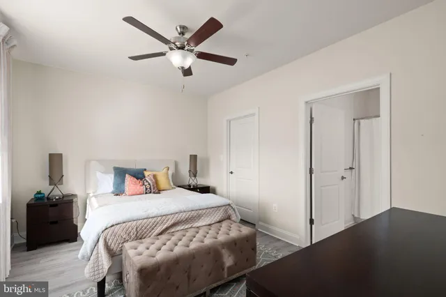 a bedroom with a bed and a closet