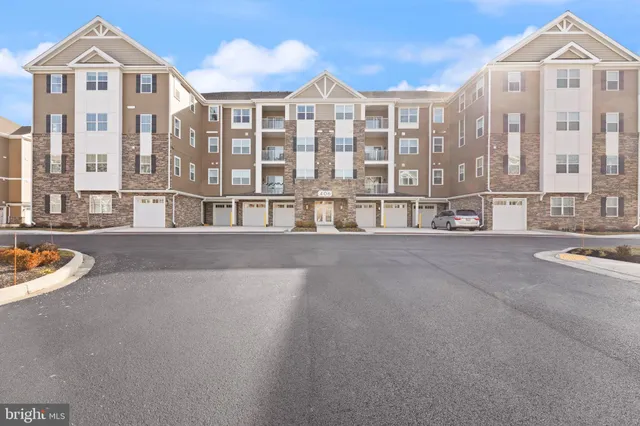 a view of a building with a garden