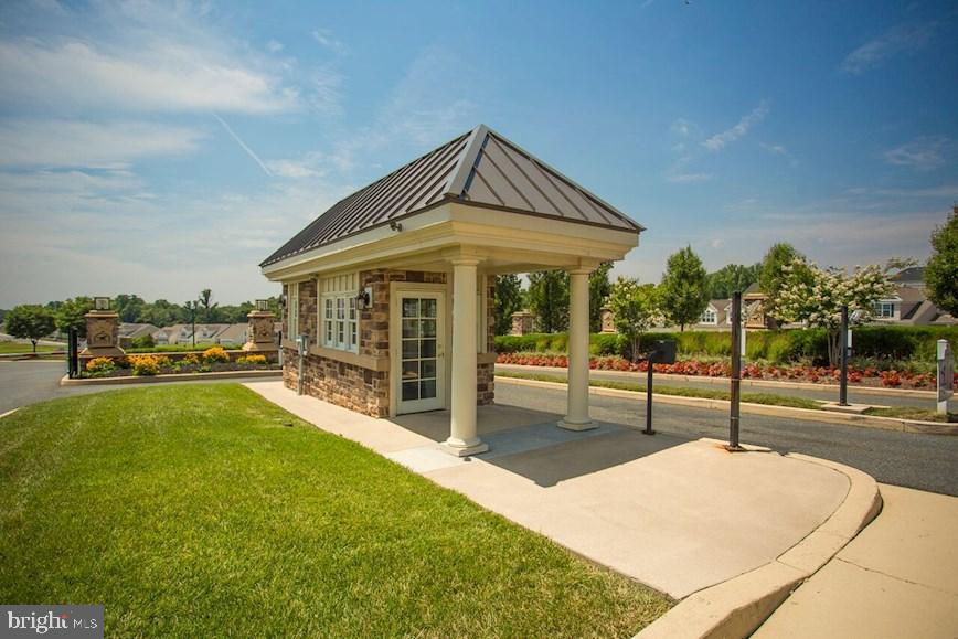 406 Bold Ruler Court, Unit 207 Havre de Grace, MD 21078 - Photo 35 of 57 a view of swimming pool with lawn chairs and iron fence