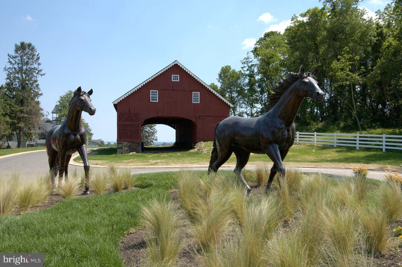 406 Bold Ruler Court, Unit 207 Havre de Grace, MD 21078 - Photo 45 of 57 a view of a house with a swimming pool
