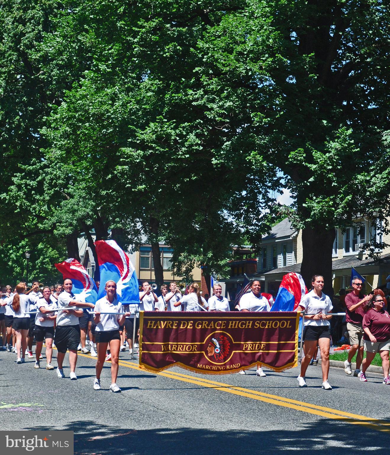 406 Bold Ruler Court, Unit 207 Havre de Grace, MD 21078 - Photo 52 of 57 a group of people sitting in a yard
