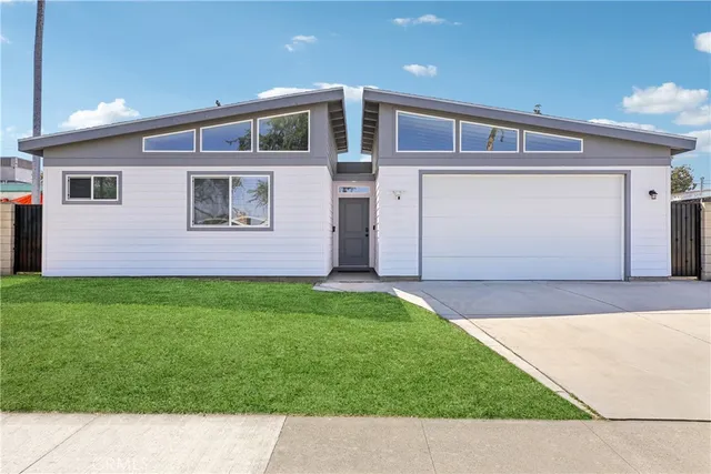 a front view of house with yard