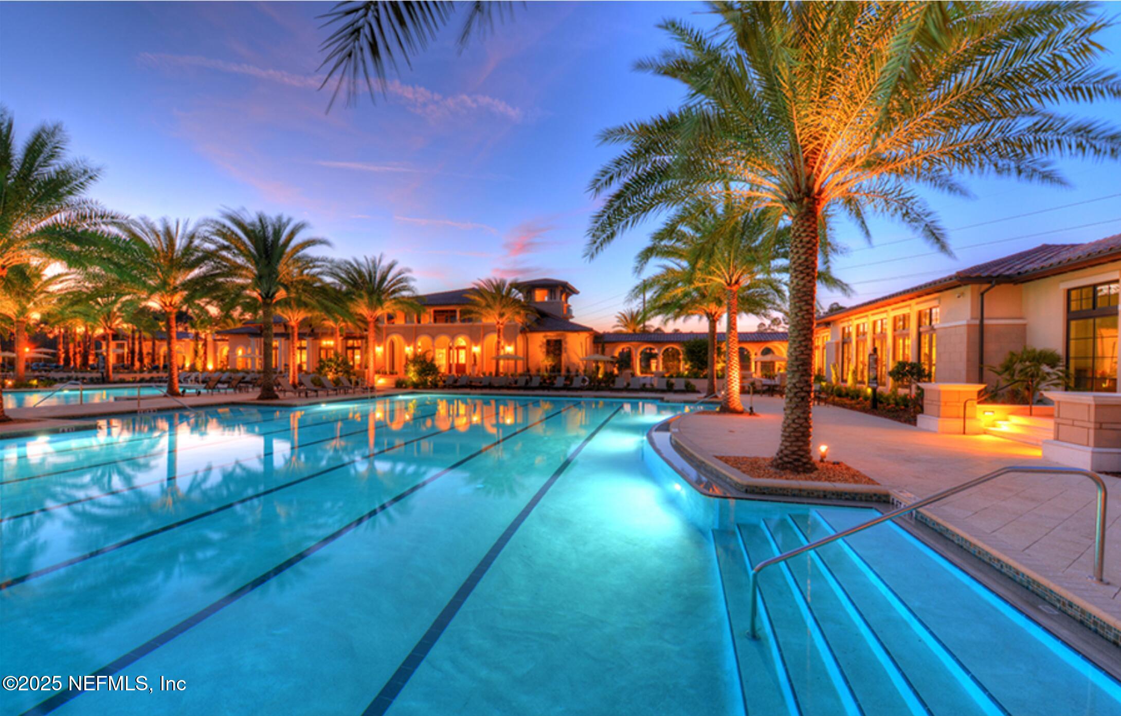 2489 Caprera Circle Jacksonville, FL 32246 - Photo 18 of 30 a view of swimming pool with a table and chairs