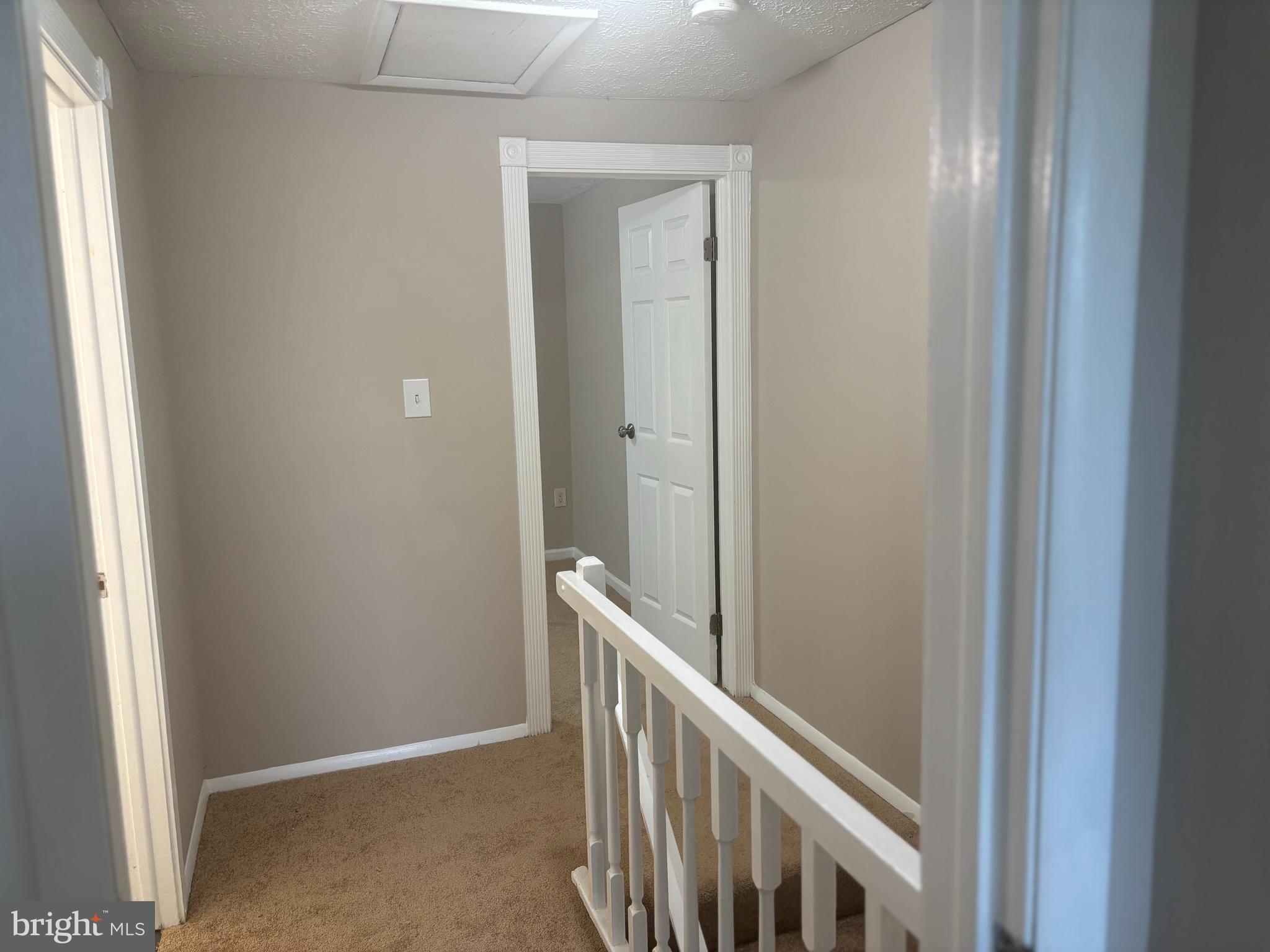 3423 Castle Way, Unit 10432 Silver Spring, MD 20904 - Photo 5 of 9 a view of a hallway with closet