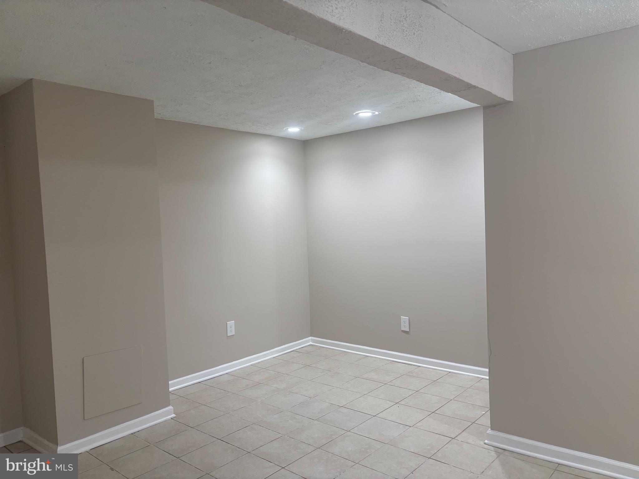 3423 Castle Way, Unit 10432 Silver Spring, MD 20904 - Photo 8 of 9 a view of an empty room