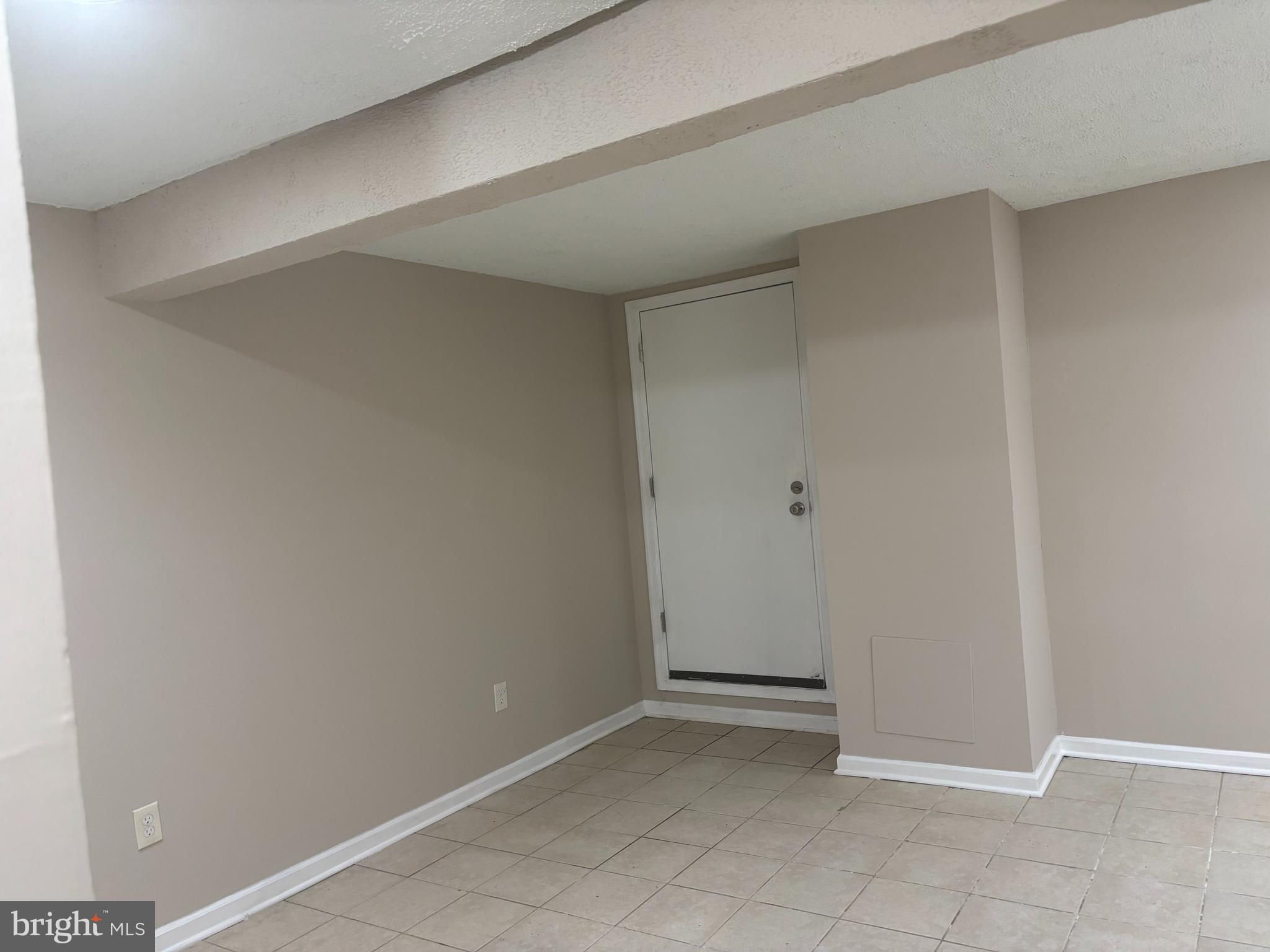 3423 Castle Way, Unit 10432 Silver Spring, MD 20904 - Photo 9 of 9 a view of an empty room