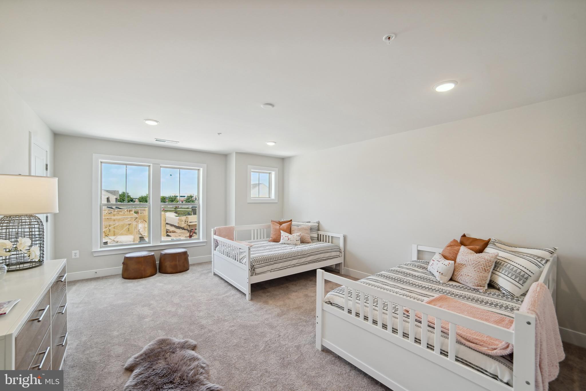 8065 Jennys Way Fulton, MD 20759 - Photo 11 of 17 a bedroom with two beds and large window