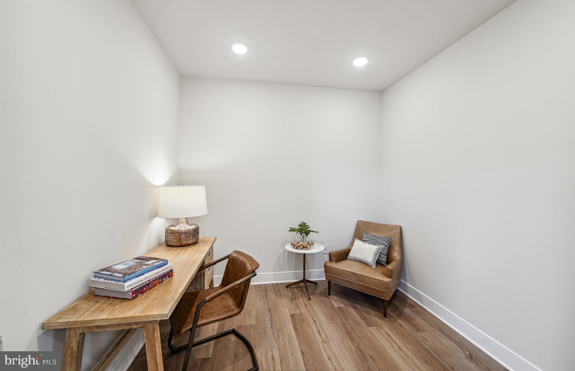 8065 Jennys Way Fulton, MD 20759 - Photo 3 of 17 a living room with furniture and a wooden floor