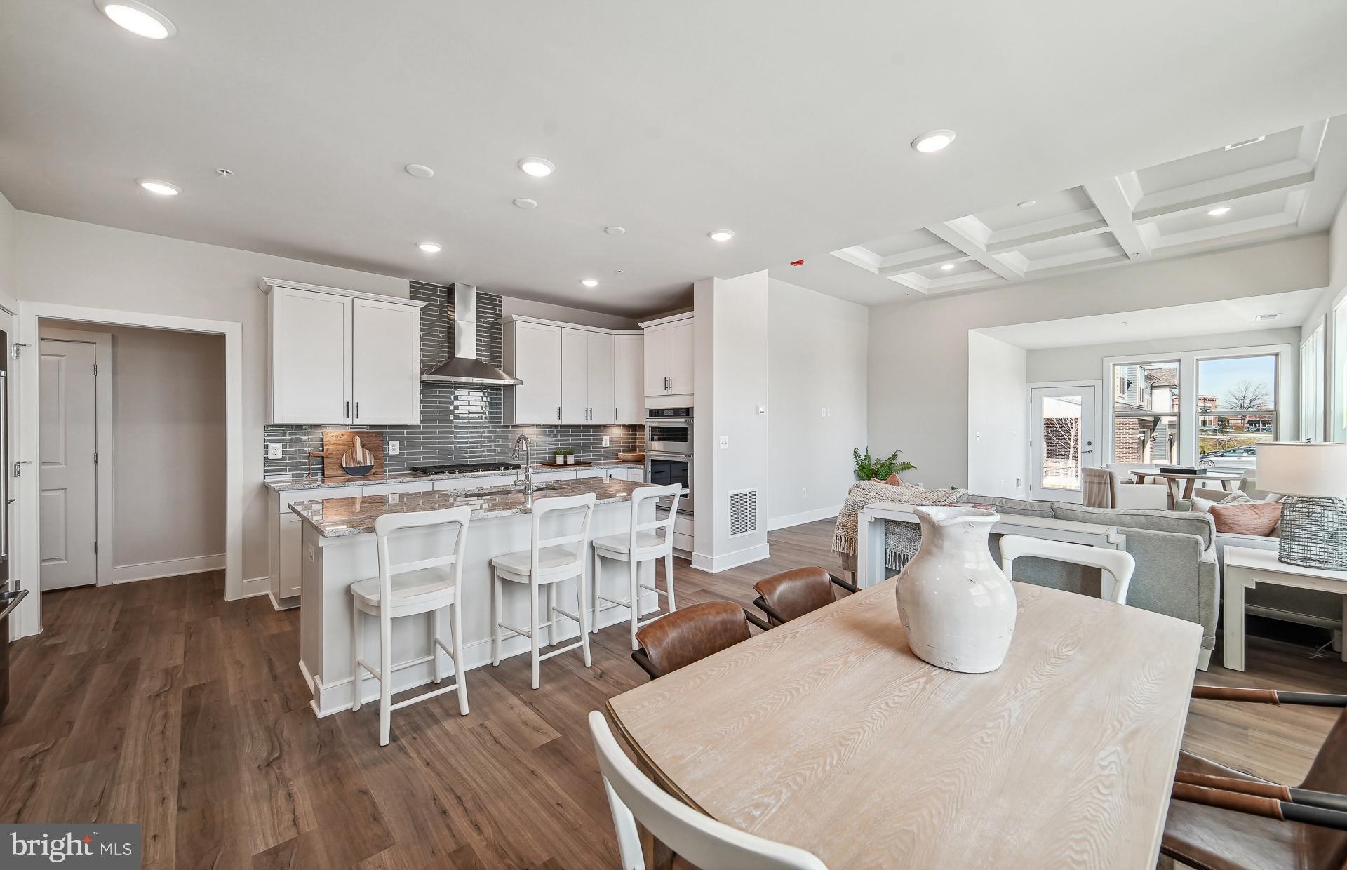 8065 Jennys Way Fulton, MD 20759 - Photo 5 of 17 a large kitchen with a table and chairs
