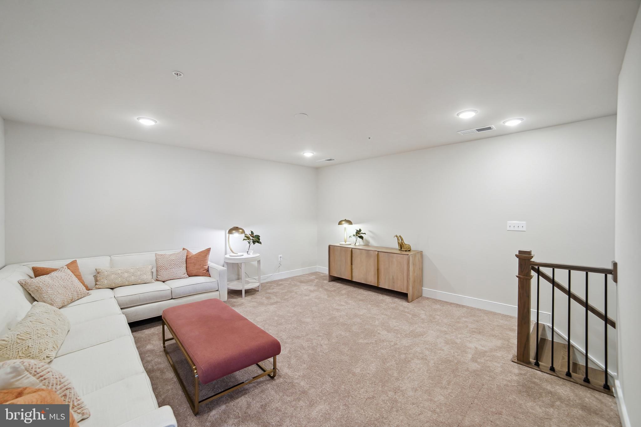 8065 Jennys Way Fulton, MD 20759 - Photo 10 of 17 a living room with furniture and a couch