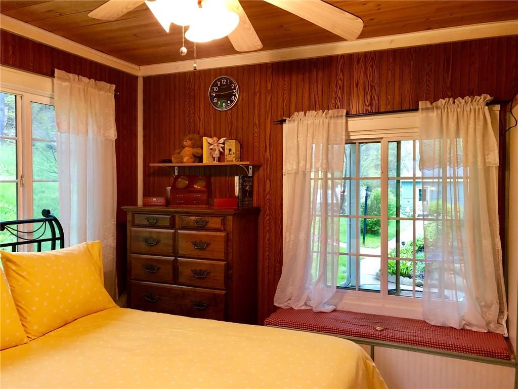 650 Shaffer Road Hookstown, PA 15050 - Photo 13 of 25 Another view of the second bedroom showing the window seat. Curl up with a book in private and watch the birds outside.