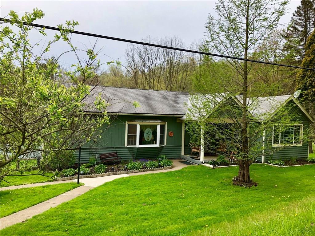 650 Shaffer Road Hookstown, PA 15050 - Photo 20 of 25 Another view of the front of the home. The sidewalk leads to steps and a driveway where you can part numerous cars. The other sidewalk leads to the detached garage.