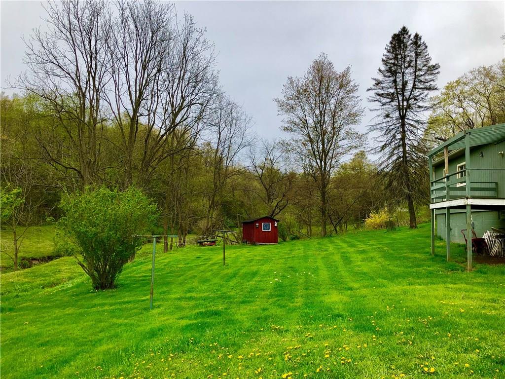 650 Shaffer Road Hookstown, PA 15050 - Photo 22 of 25 Back yard showing the Deck off the back of the Living Room and included Shed.