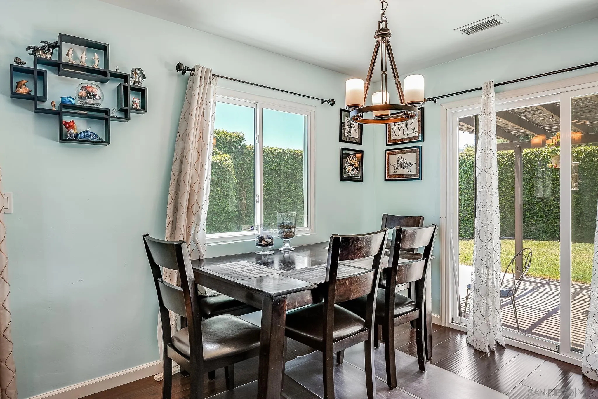 13902 Powers Road Poway, CA 92064 - Photo 13 of 32 a dining room with furniture a chandelier and window