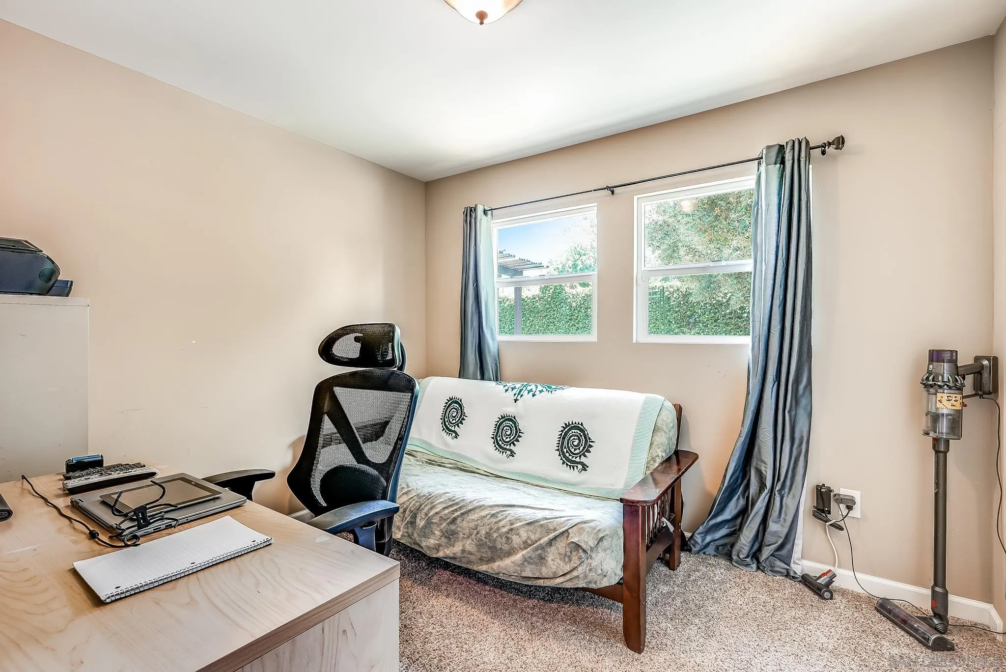 13902 Powers Road Poway, CA 92064 - Photo 21 of 32 a bedroom with furniture and a window