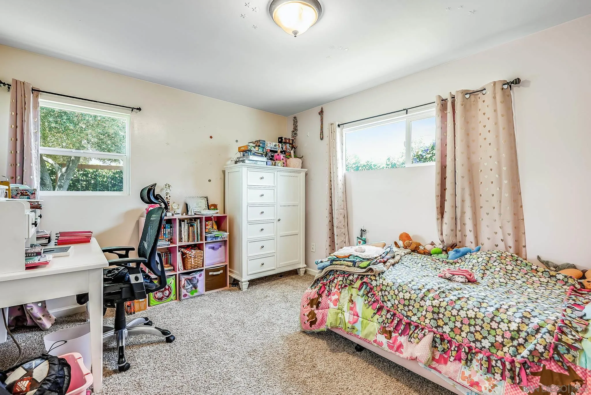 13902 Powers Road Poway, CA 92064 - Photo 24 of 32 a bedroom with a bed and a window