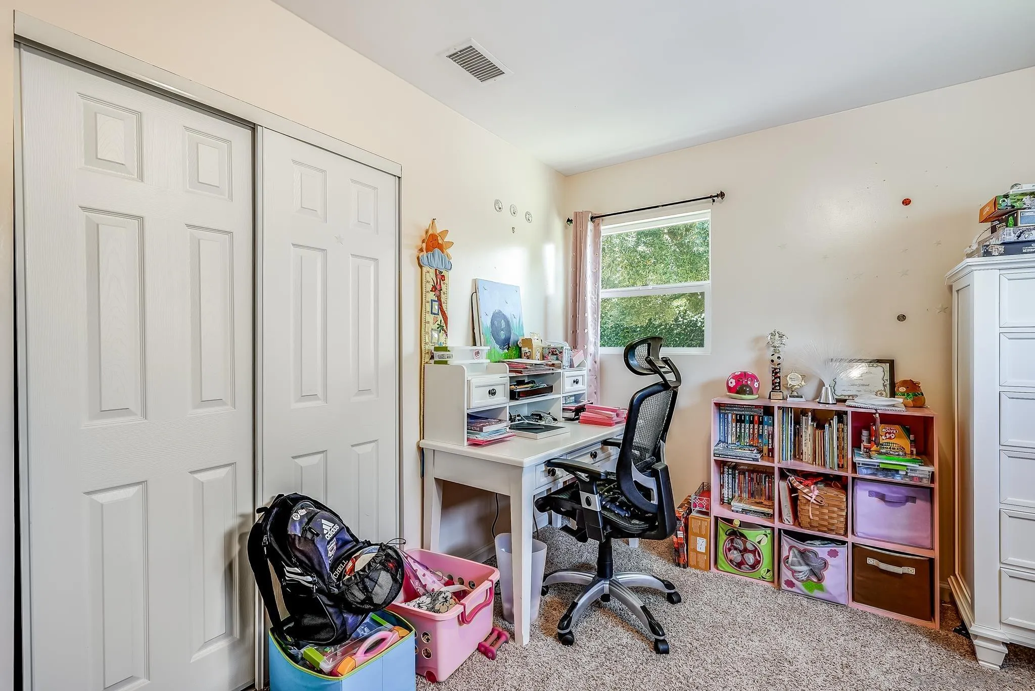 13902 Powers Road Poway, CA 92064 - Photo 26 of 32 a view of a workspace with furniture and a window