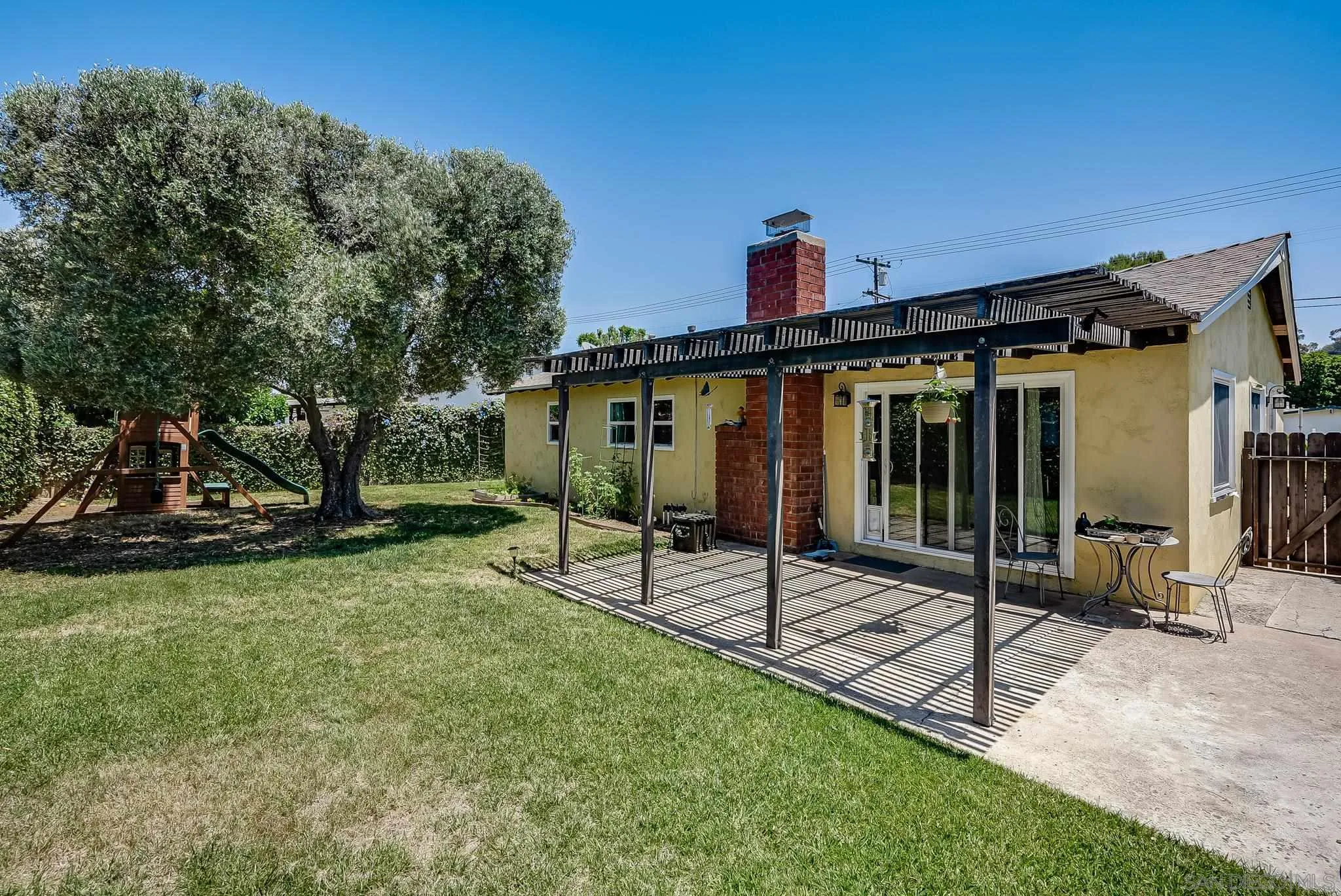 13902 Powers Road Poway, CA 92064 - Photo 3 of 32 a view of a house with backyard and sitting area