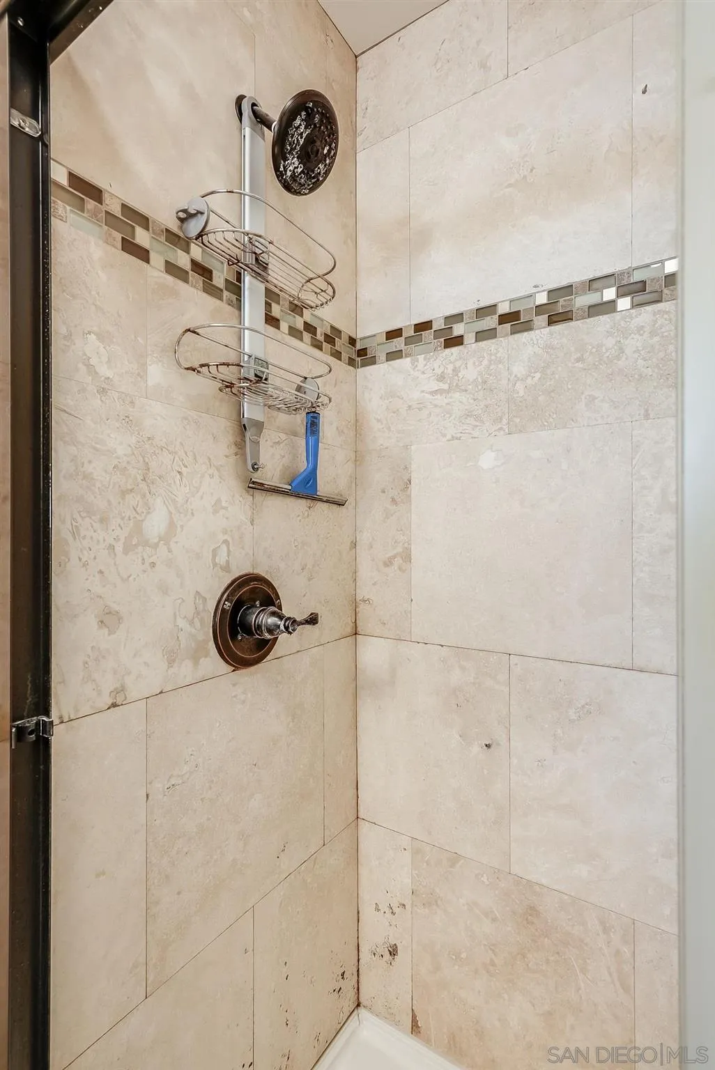 13902 Powers Road Poway, CA 92064 - Photo 32 of 32 a bathroom with a shower and a mirror