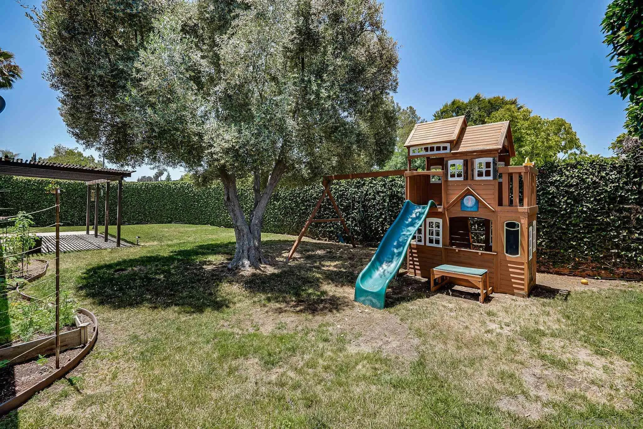 13902 Powers Road Poway, CA 92064 - Photo 4 of 32 a view of a park with slide